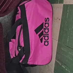 Pink and black Adidas bag